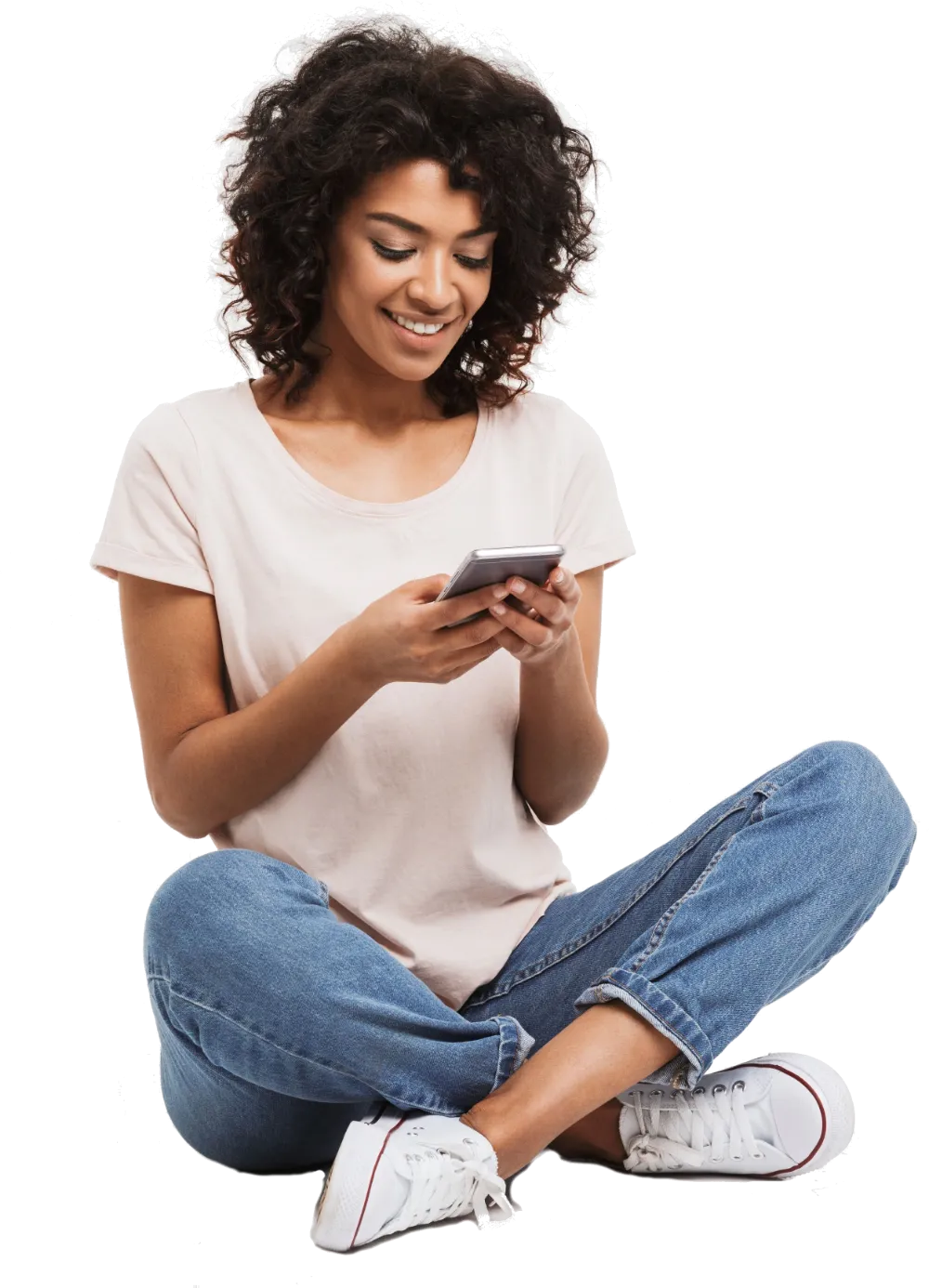 Brunette woman sat on the floor on her phone