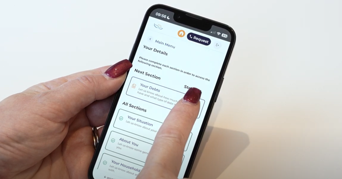woman demonstrating the Angel Advance Online Debt Advice Tool on iphone
