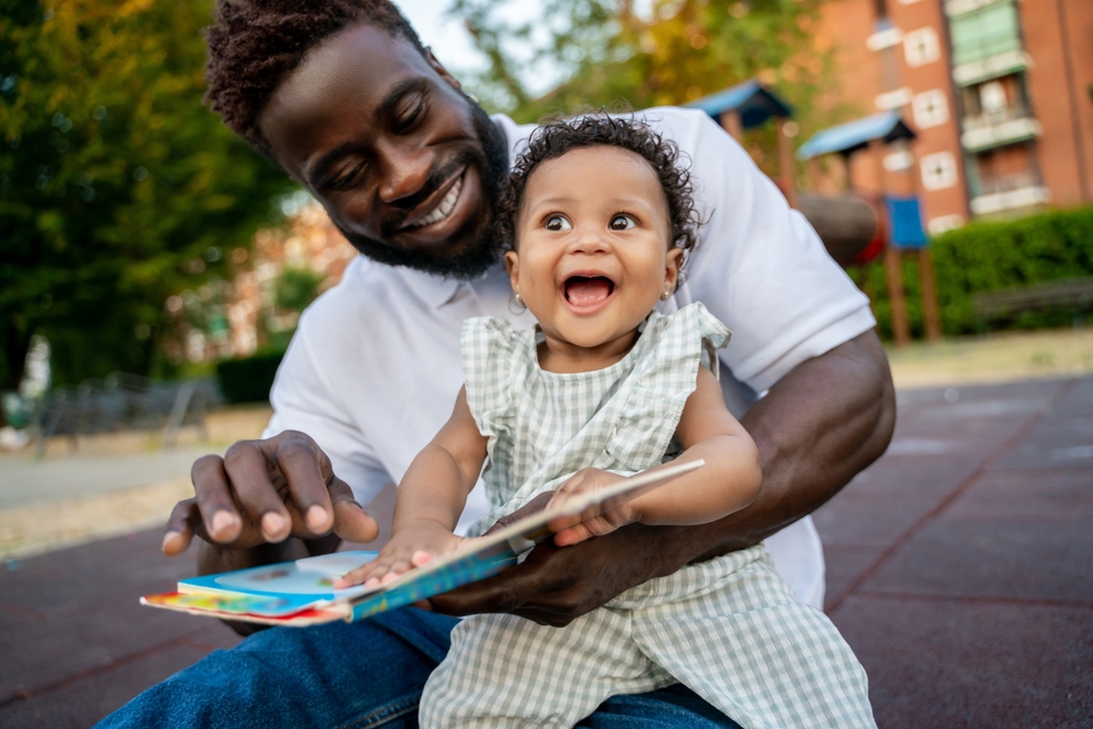 a happy child learning with a childcare provider